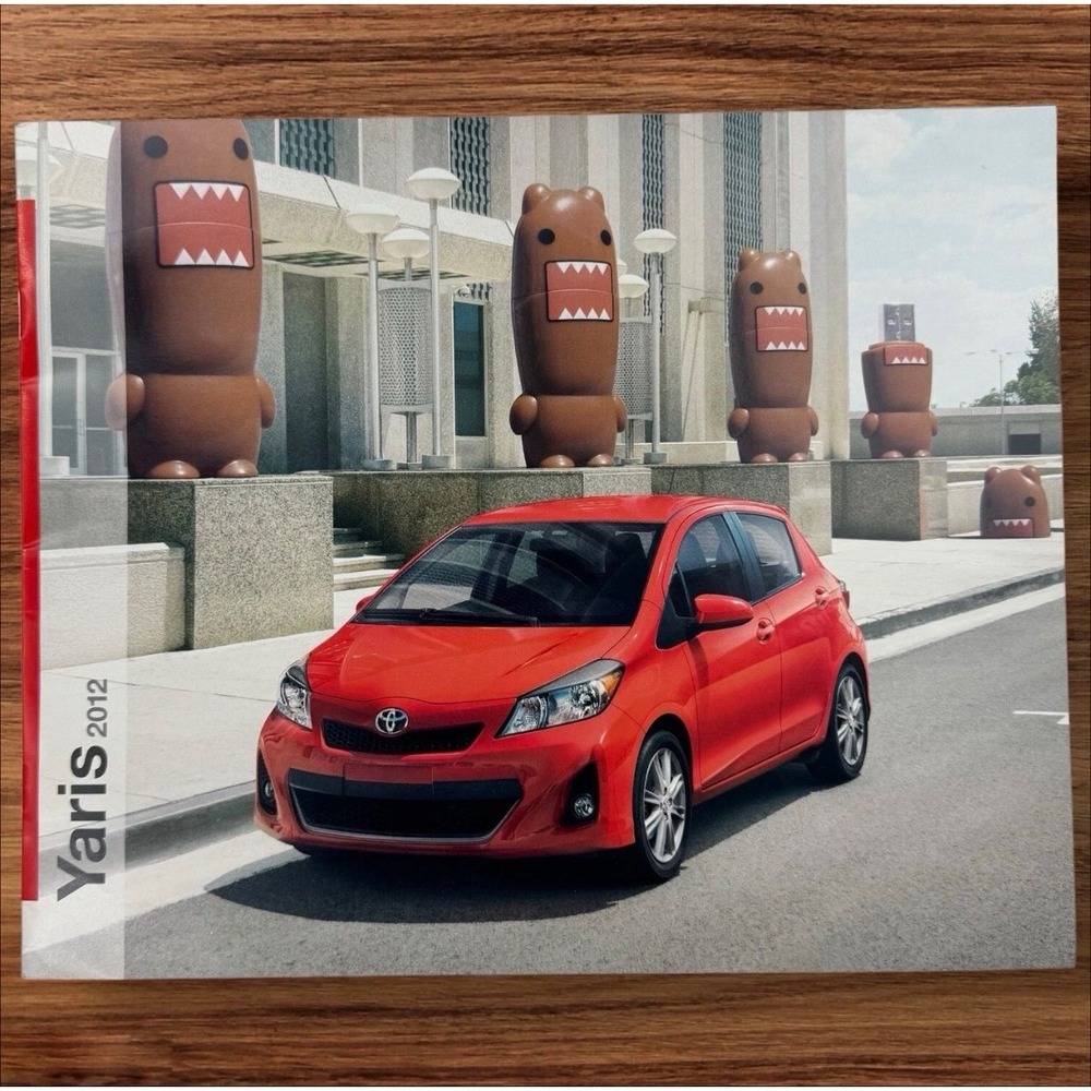 2012 Toyota Yaris Sales Brochure Domo-kun Character Red Hatchback JDM Art
